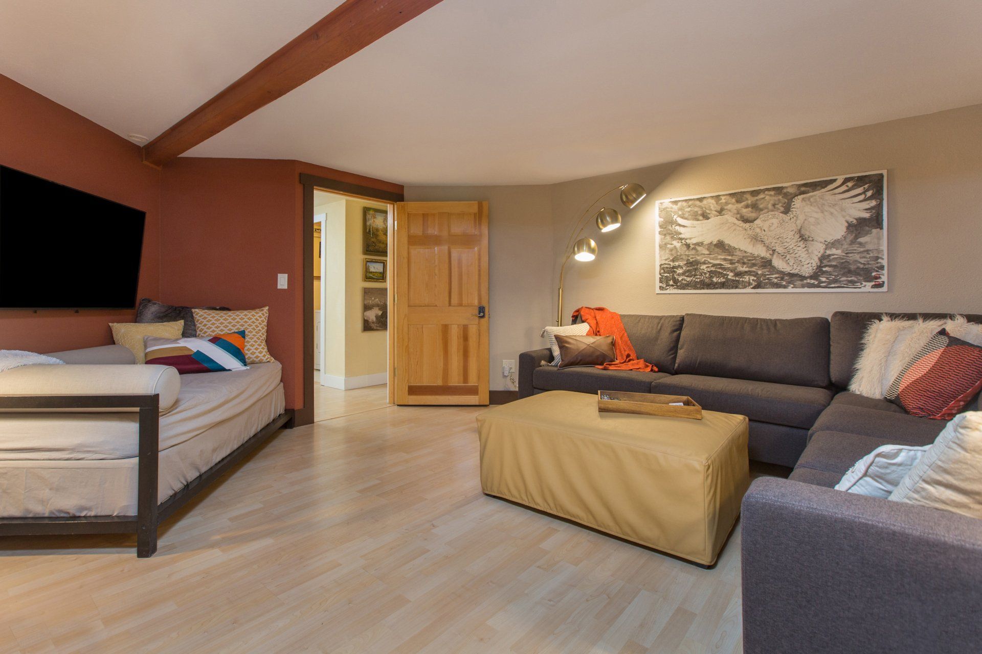 Mt. Benson Suite 1 bedroom suite in Bell In The Woods B&B in Alaska. Living room with a large sleeping sofa and a day bed.