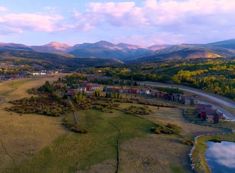 Scenic aerial view of Grand Park Fraser, CO mountain community with homes.