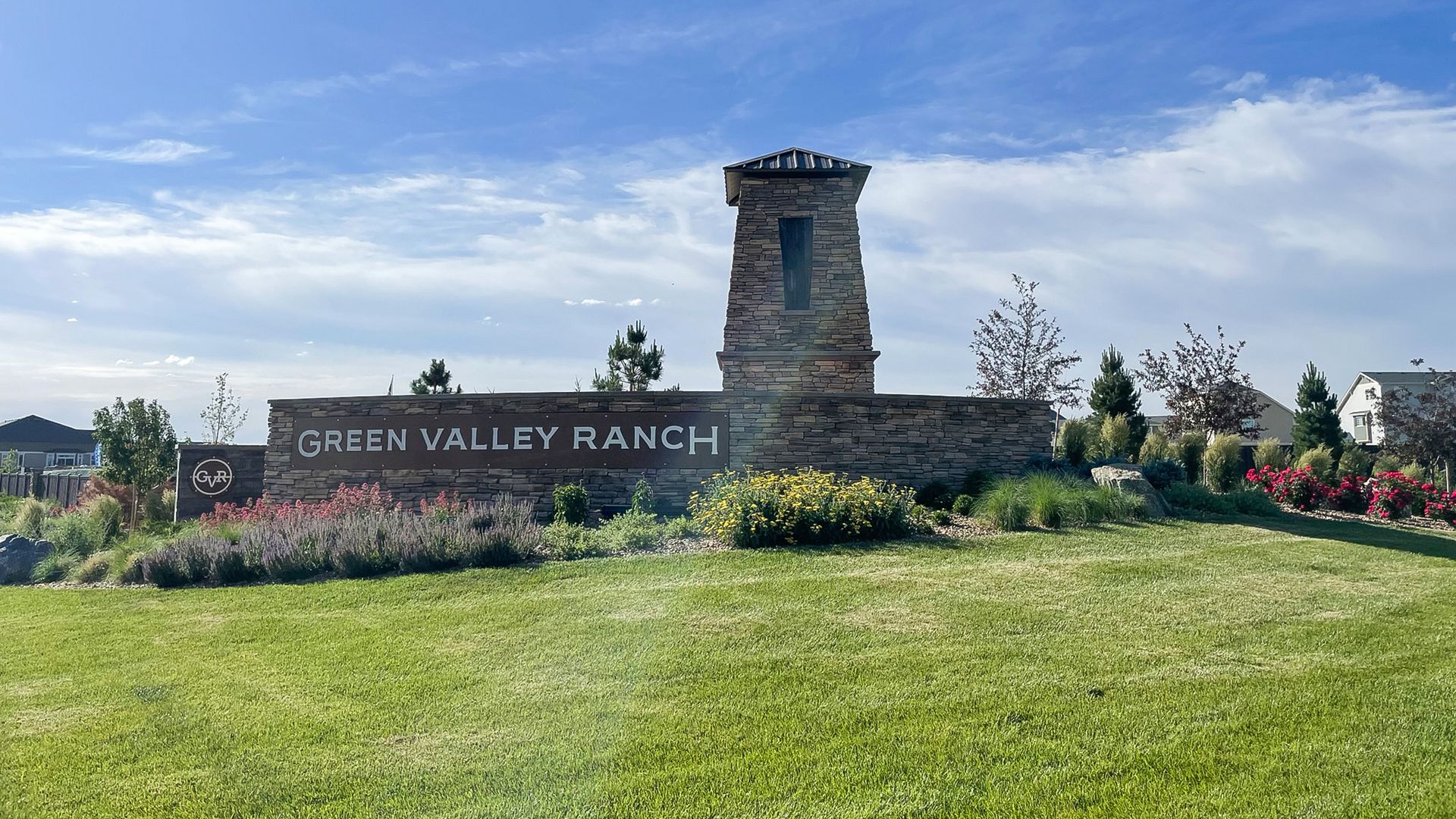 Stacked stone entrance sign for Green Valley Ranch.