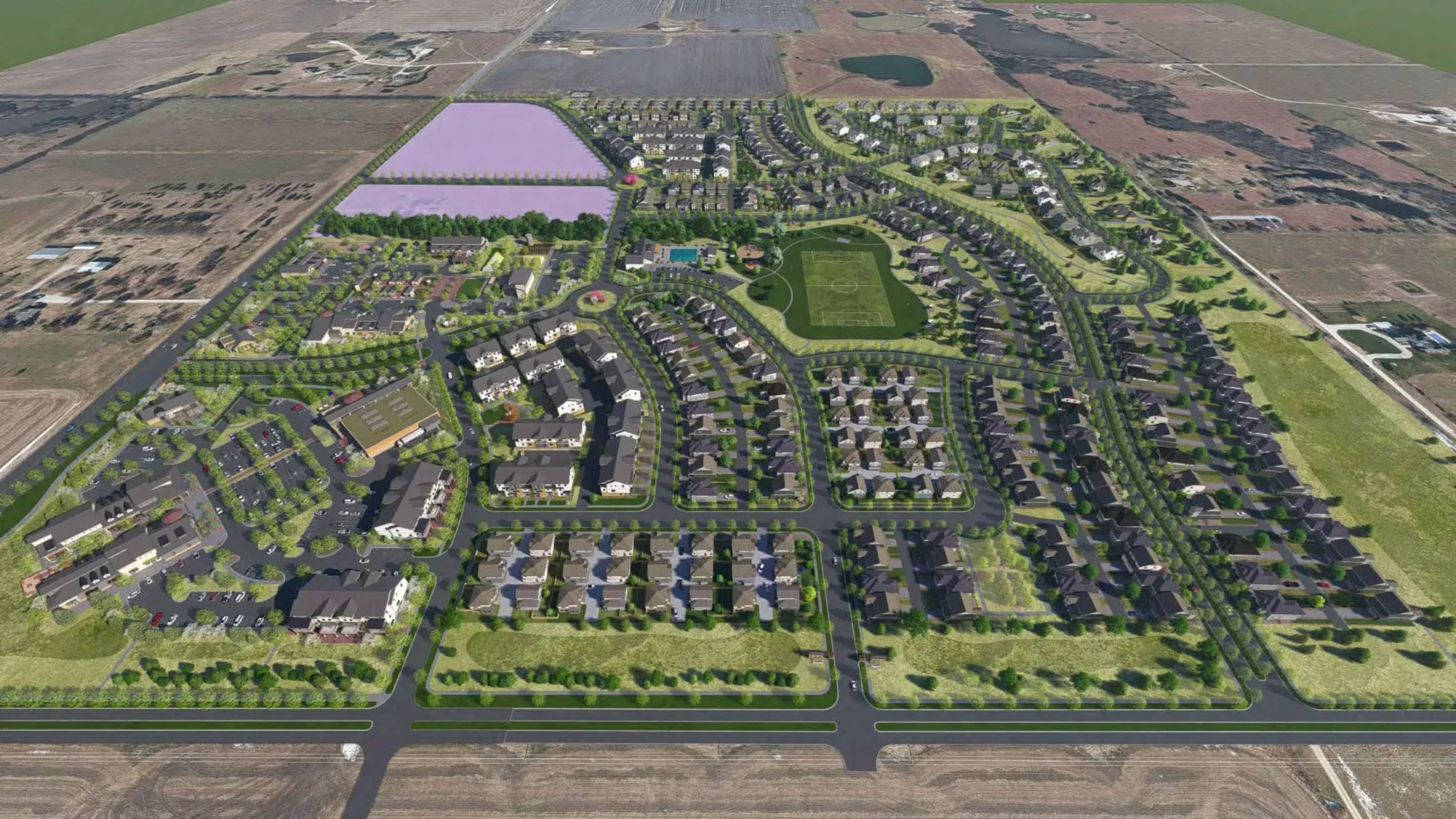 Aerial view of a suburban neighborhood with winding streets, houses, trees, and a central green park.