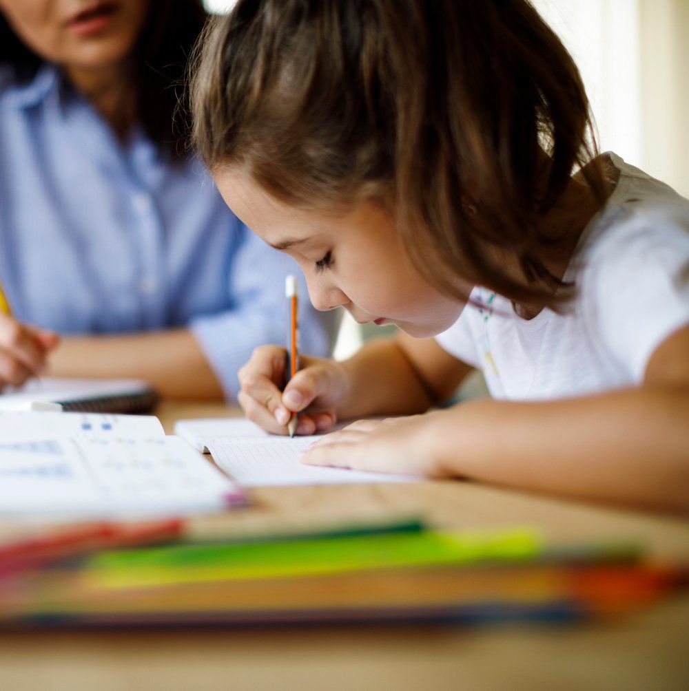 Studying Little Girl — Cheyenne, WY — I Am A Promise Daycare Studying Little Girl — Cheyenne, WY — I Am A Promise Daycare