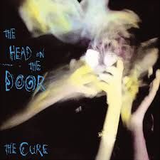 The cover of the album the head on the door by the cure.
