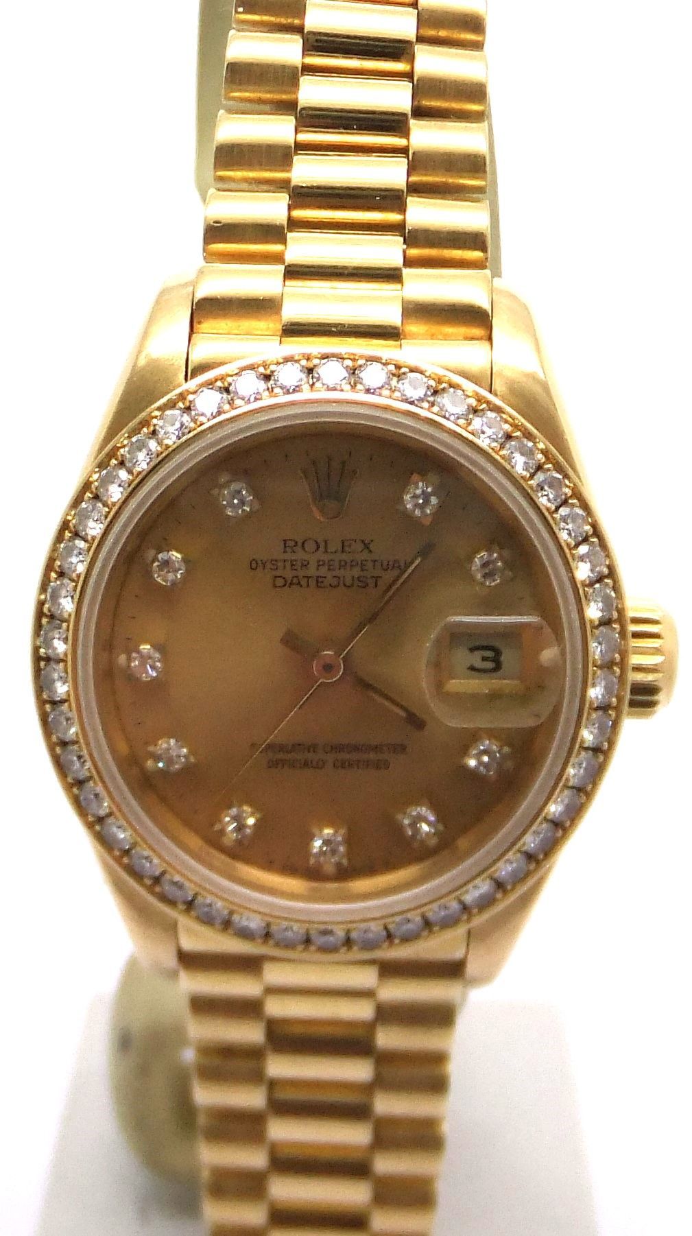 Ladies Rolex Date-Just 18ct gold  26mm with Champagne Diamond set dial and Bezel, Automatic Movement watch. 
