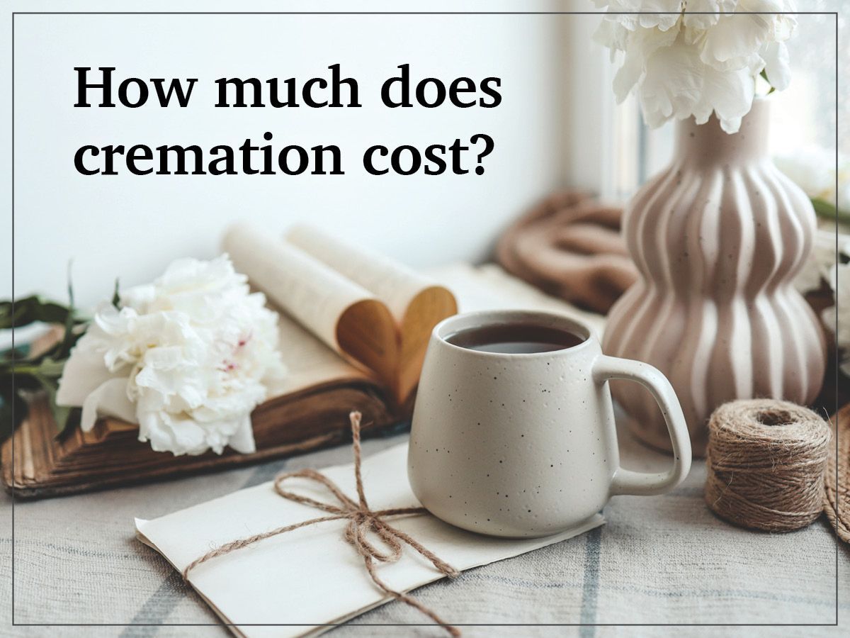 “How much does cremation cost?” text over a memorial still life with flowers, mug, vase, and candles