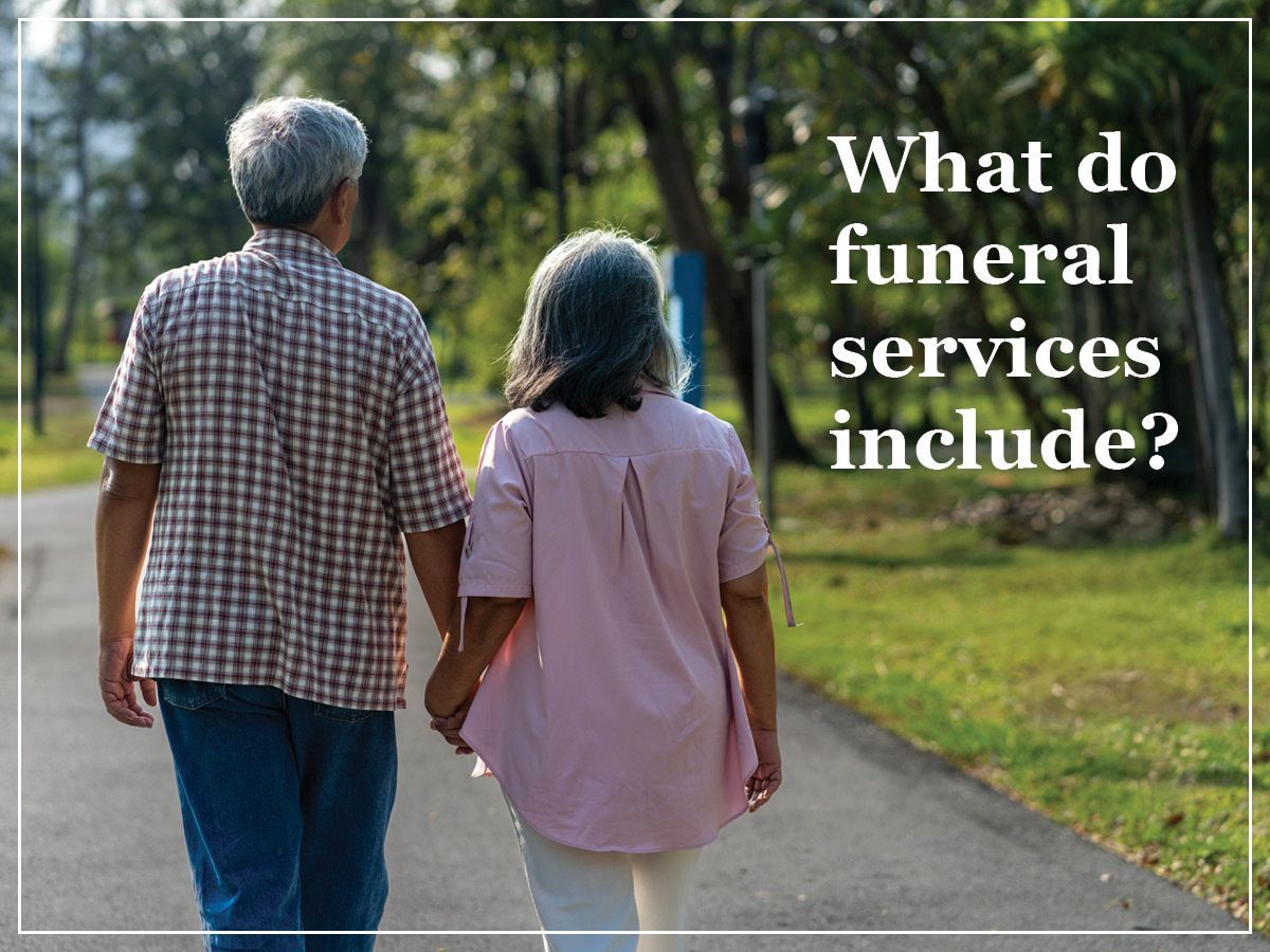 Older couple walking hand in hand on a park path with text: “What do funeral services include?”
