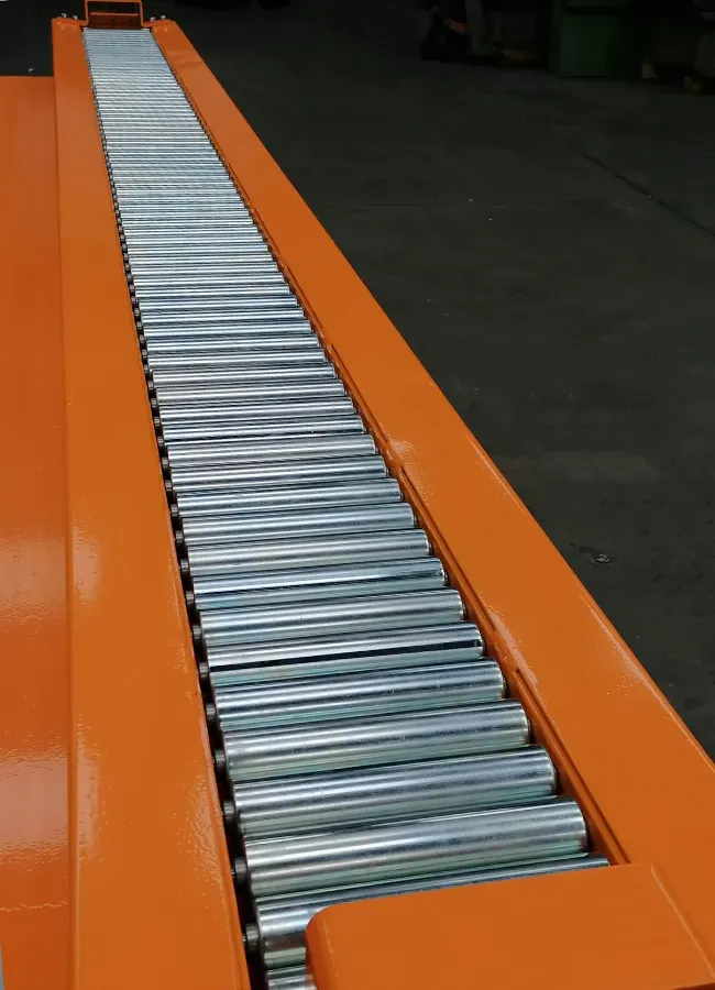 Custom engineered shuttle for handling plastic film rolls, rolls reels and coils handling equipment