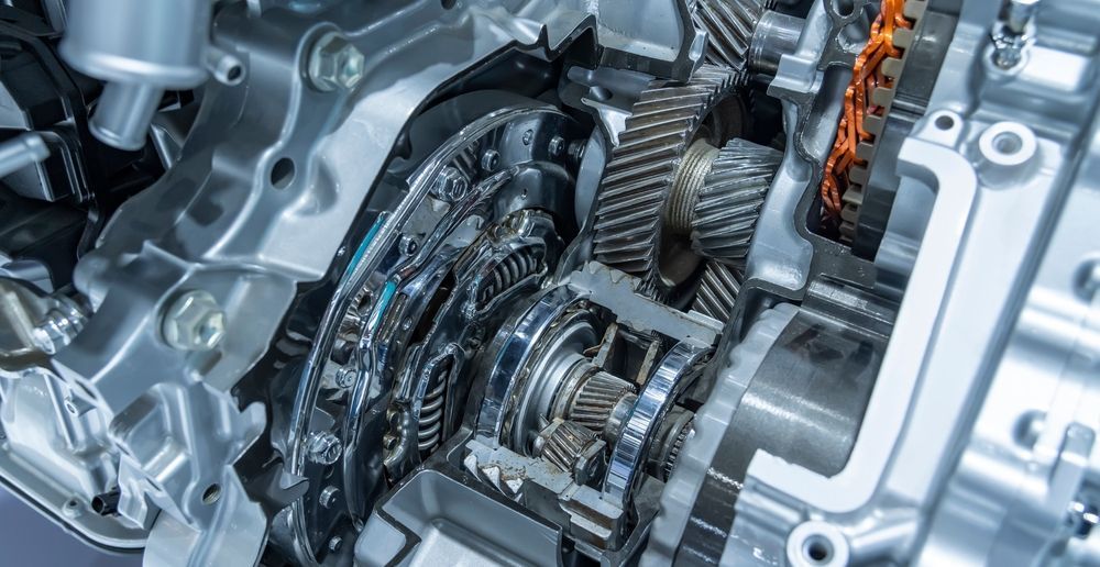 A close up of the inside of a car engine.