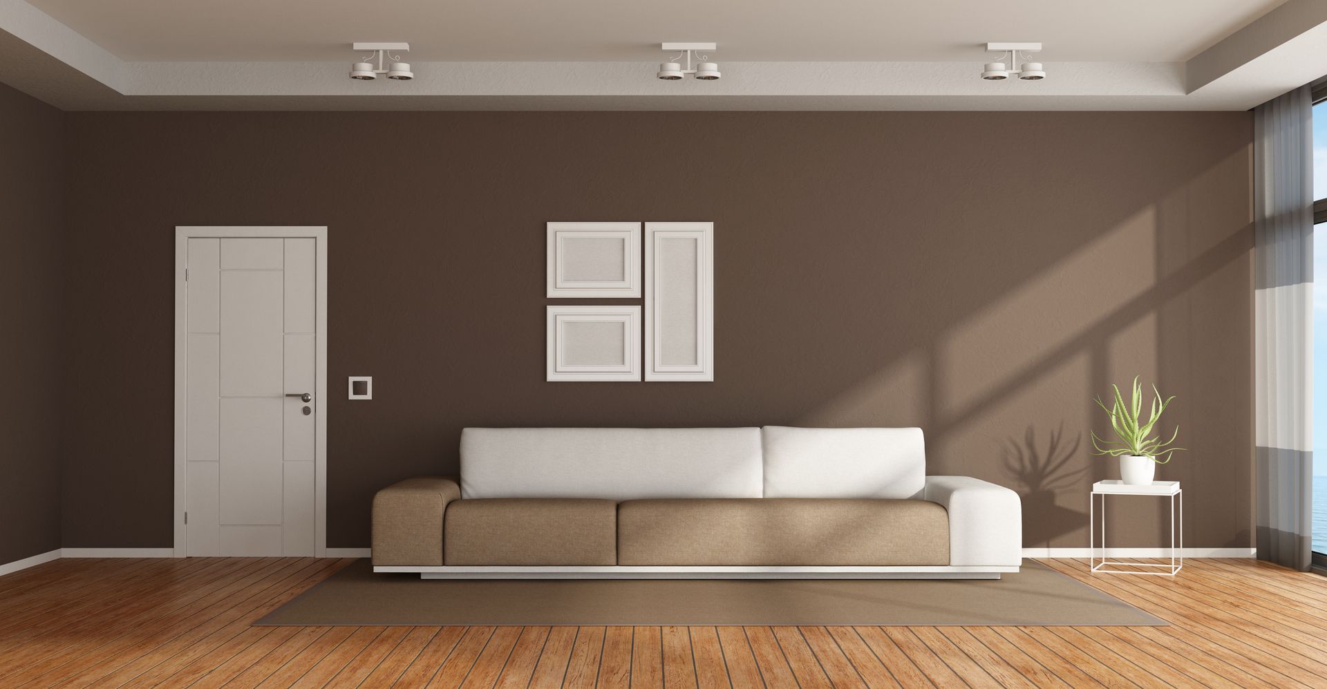 Modern living room with beige sofa, brown wall, white decor, and a potted plant by the window