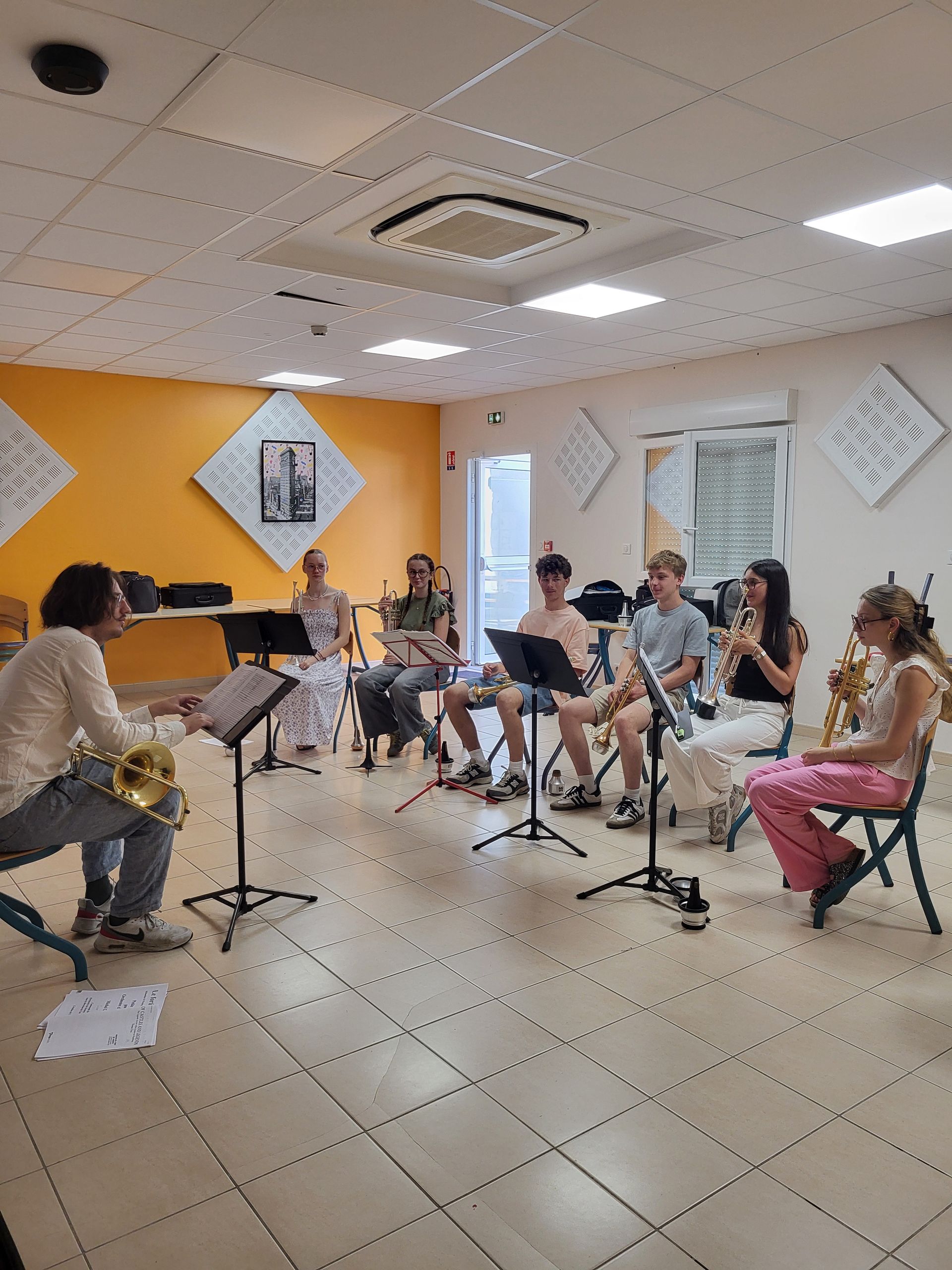 Pupitre de trompette dirigé par un tromboniste