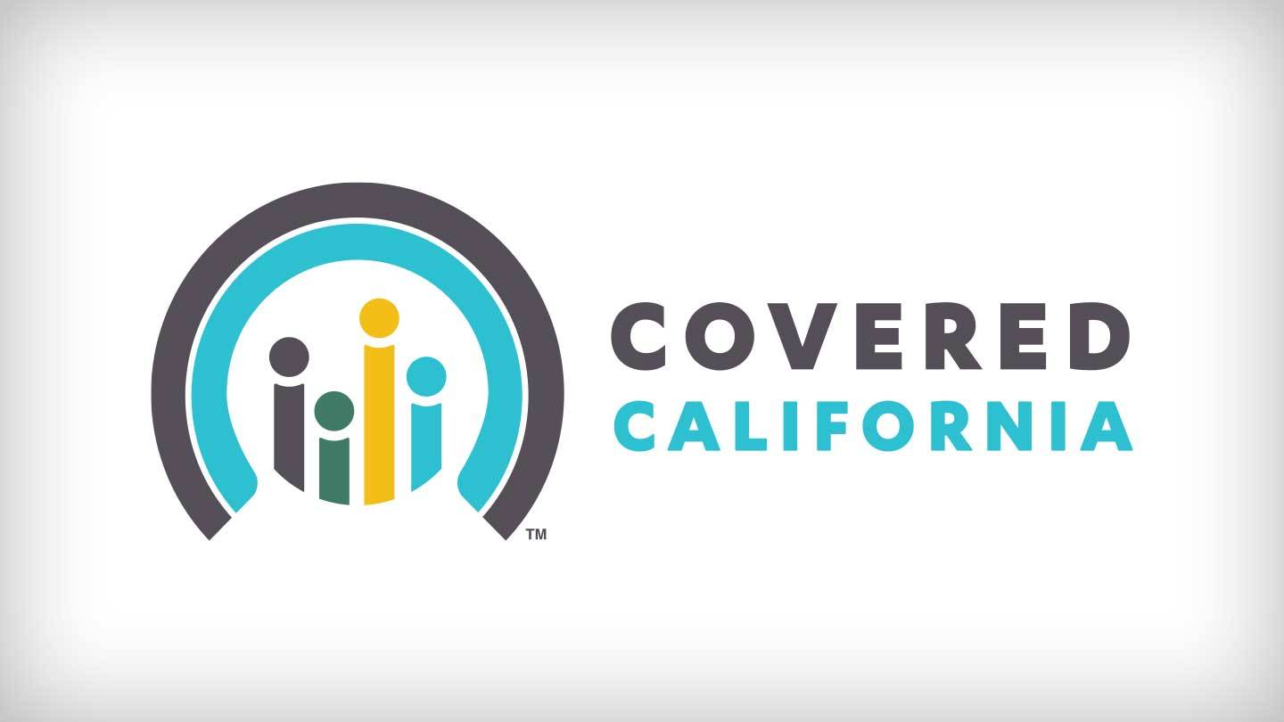 A logo for covered california is shown on a white background.