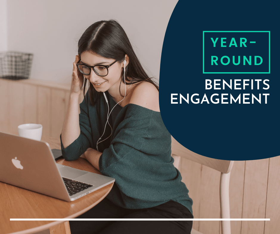 Woman looking at a computer, researching benefits engagement