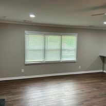 There is a large window in the middle of the room.