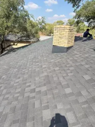 A close up of a roof with shingles on it.