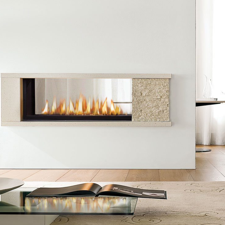 A living room with a fireplace and a coffee table