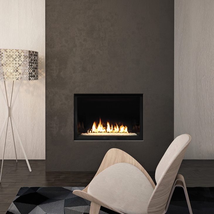 A living room with a fireplace and a chair