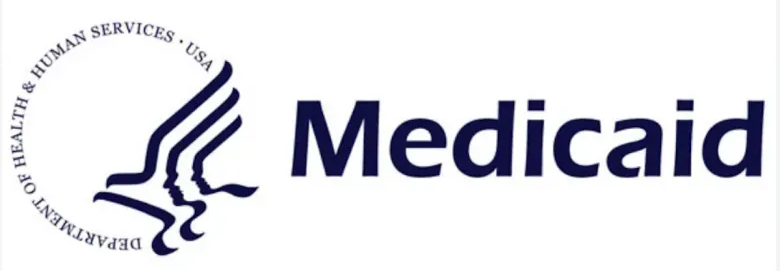 Medicaid logo: blue text and symbol of a stylized bird over the words “Medicaid”.