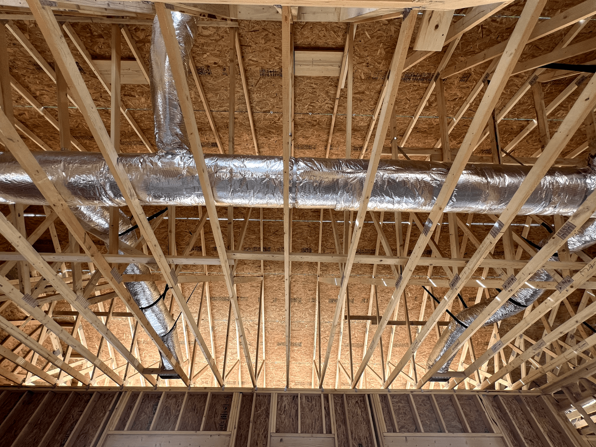 Looking up at the ceiling of a building under construction.