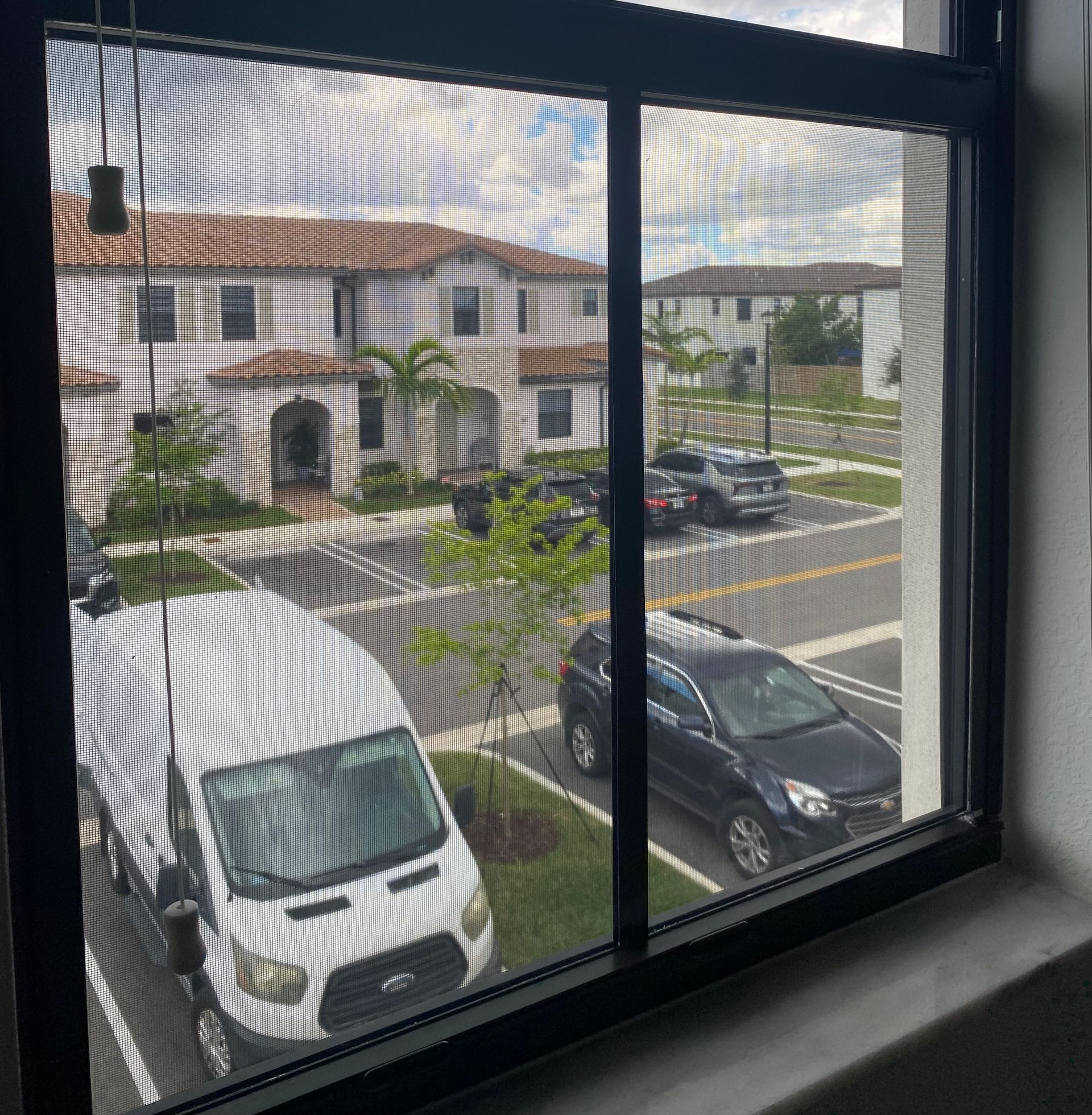 winow with work van in the background