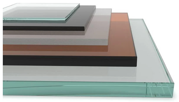 Stack of various colored glass sheets: clear, gray, brown, and black.