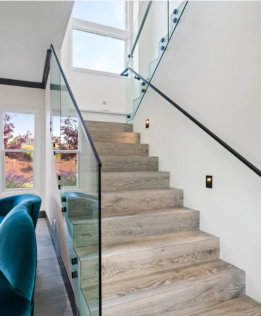Custom Frameless Glass Stair Railing Installation completed for a luxury residence in Key Biscayne.