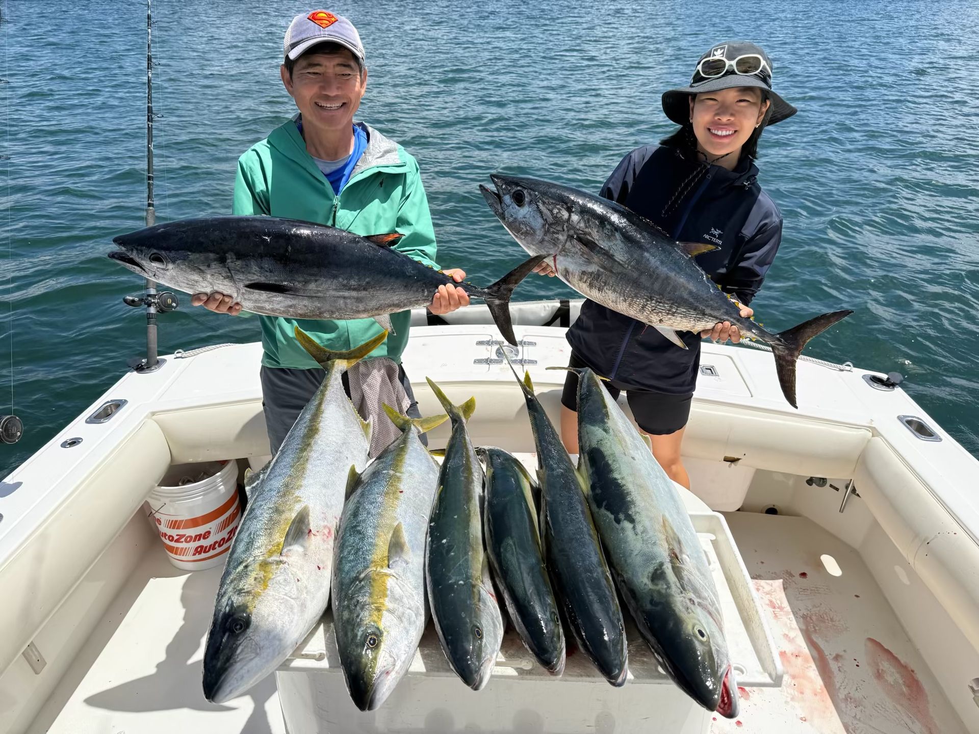 Clients Holding Fish