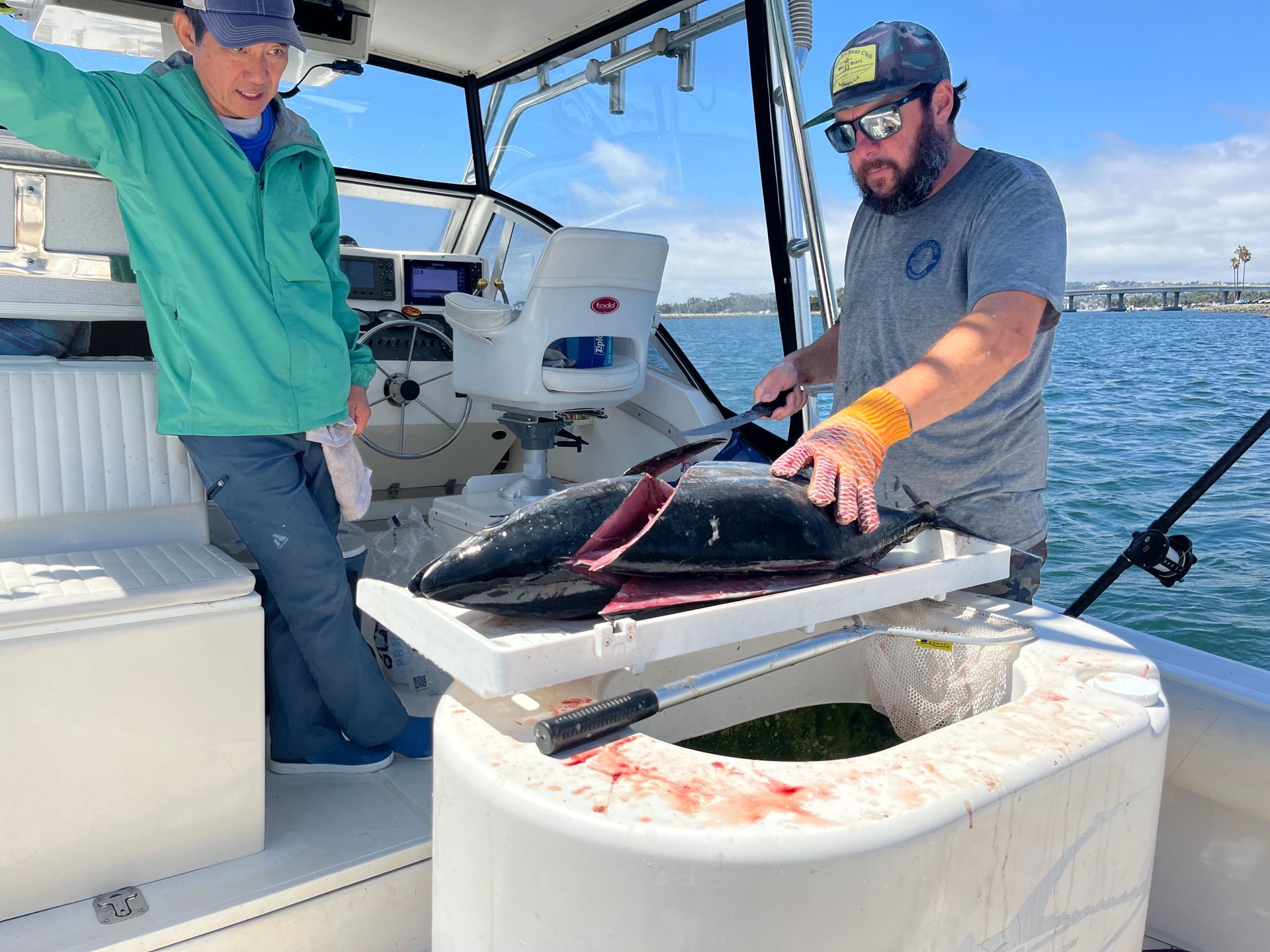 cleaning fish on the charter boat