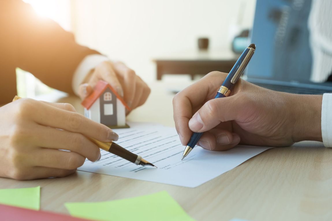 Signing a document at the notary