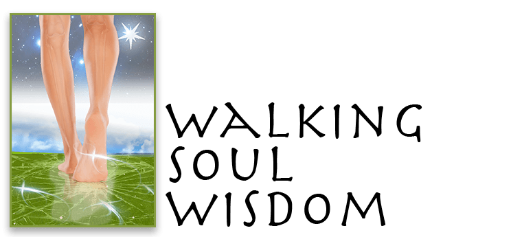 Bare legs walking on green grass;