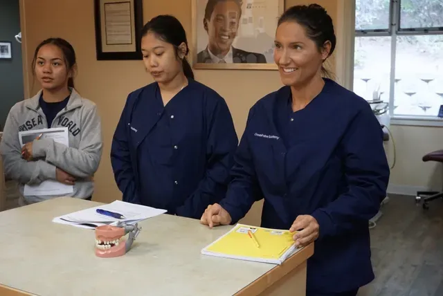 Dental Assistants learning in lab