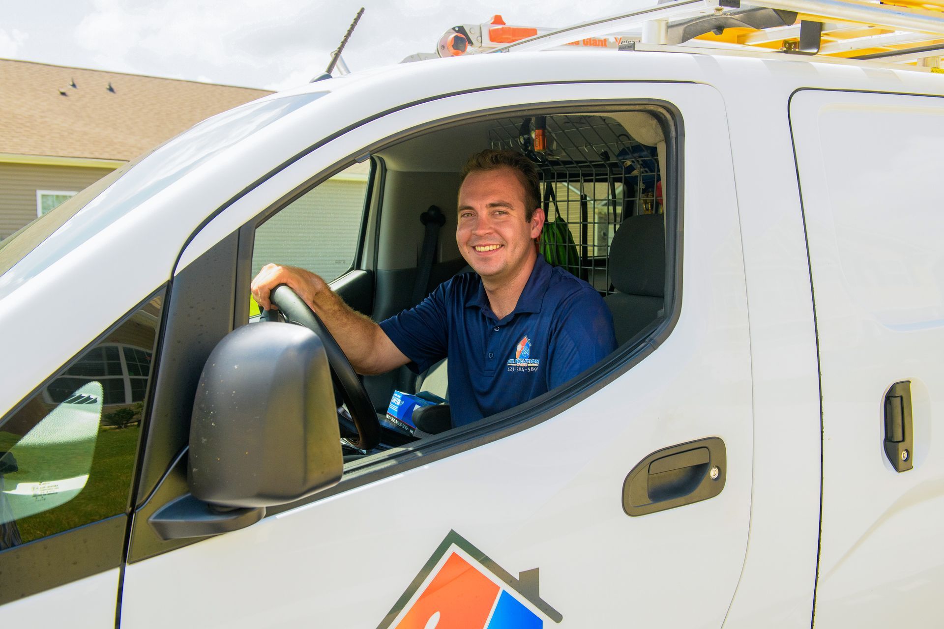 air solutions hvac business owner phillip standing next to his HVAC installation vehicle