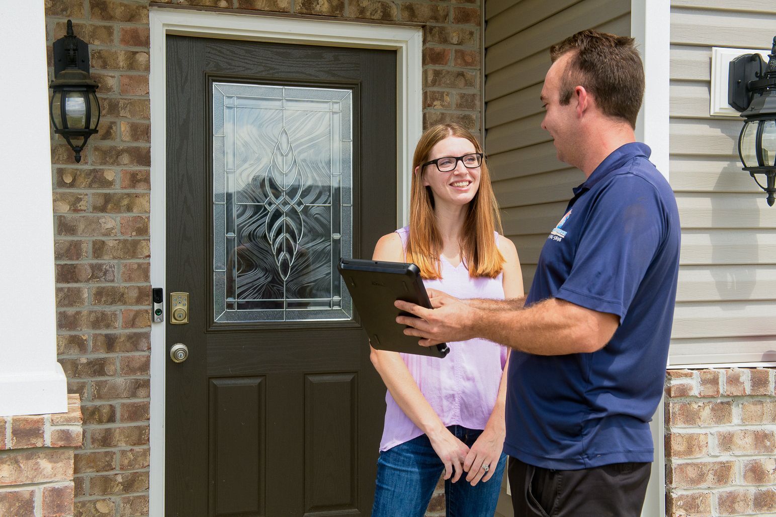air solutions hvac business owner phillip discussing HVAC services with a client