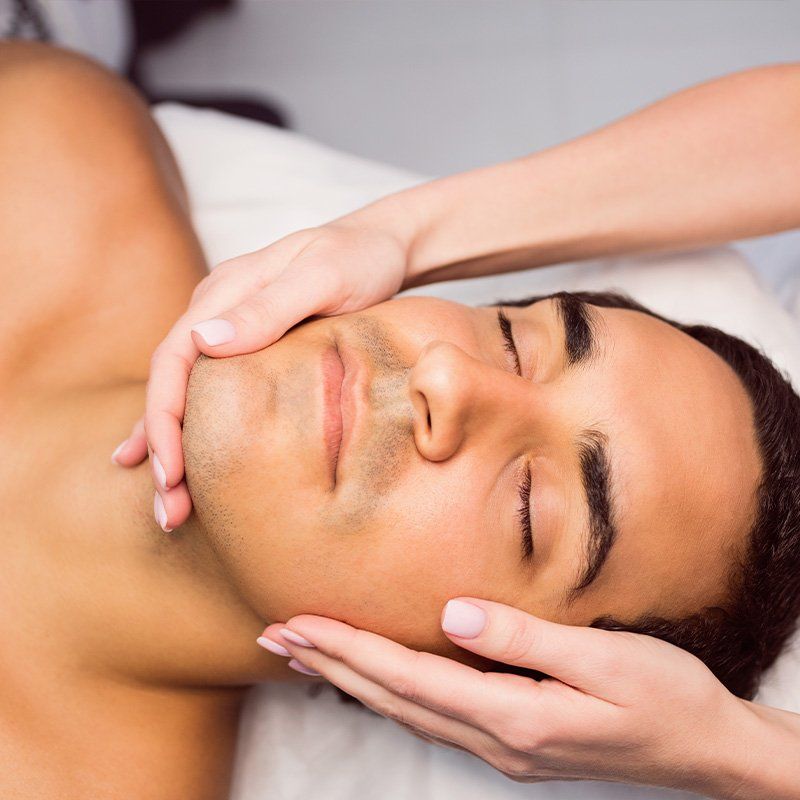 man getting facial