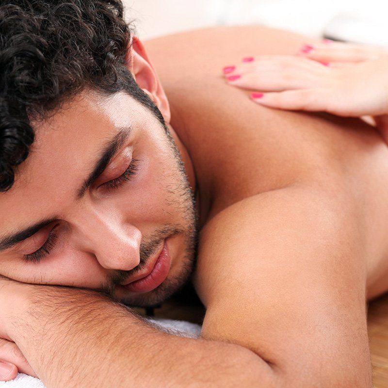 man getting a back facial