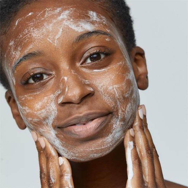 Woman applying Dermalogica Special Cleansing Gel