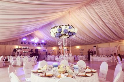 Large Room With Tables and Chairs Set Up for a Wedding Reception — The Flower Station Townsville In Kirwan, QLD A Large Room With Tables and Chairs Set Up for a Wedding Reception — The Flower Station Townsville In
Kirwan, QLD