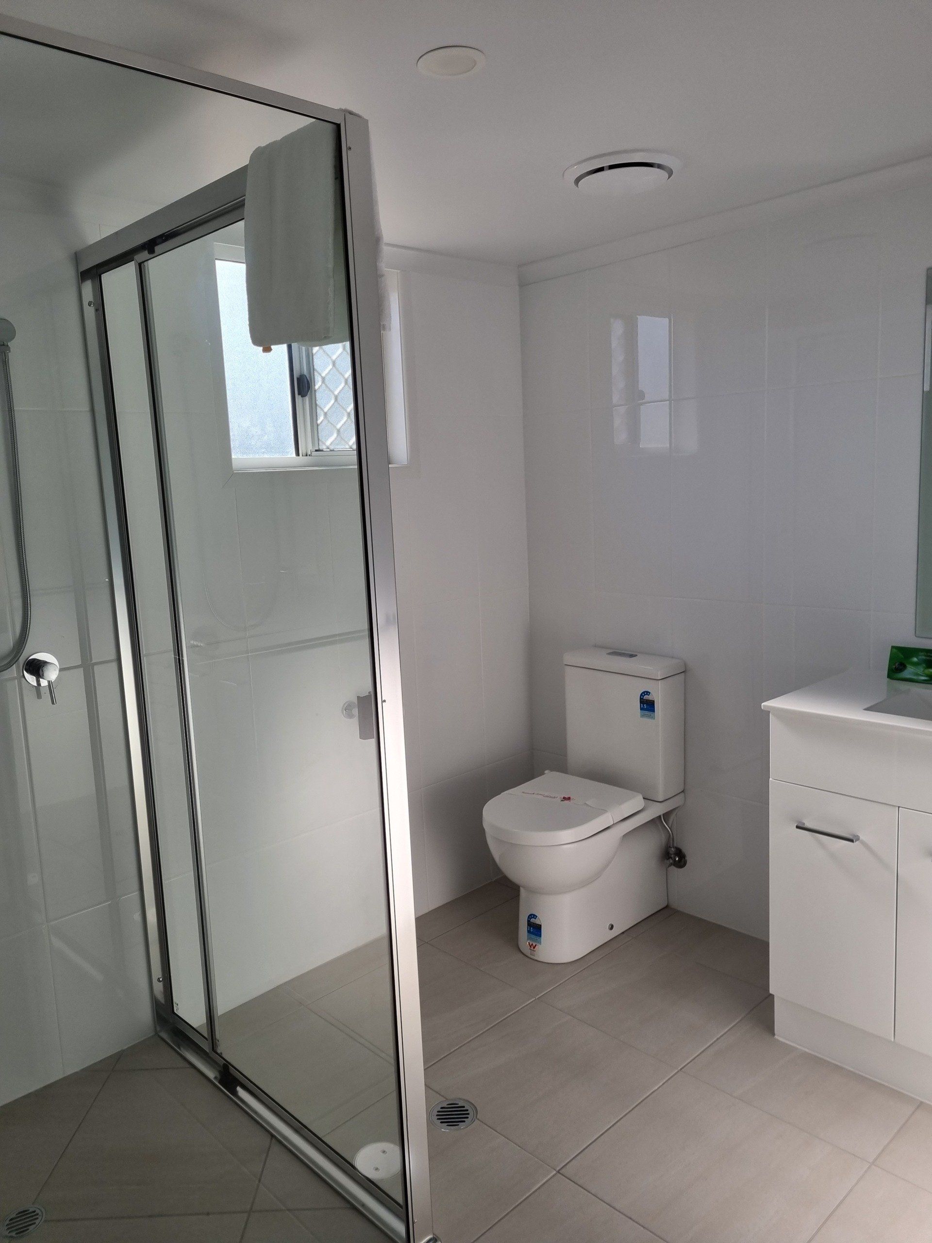 twin studio apartment bathroom