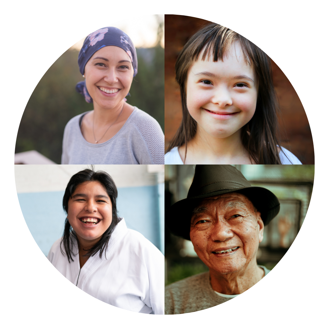 Four people in a circle with one wearing a hat