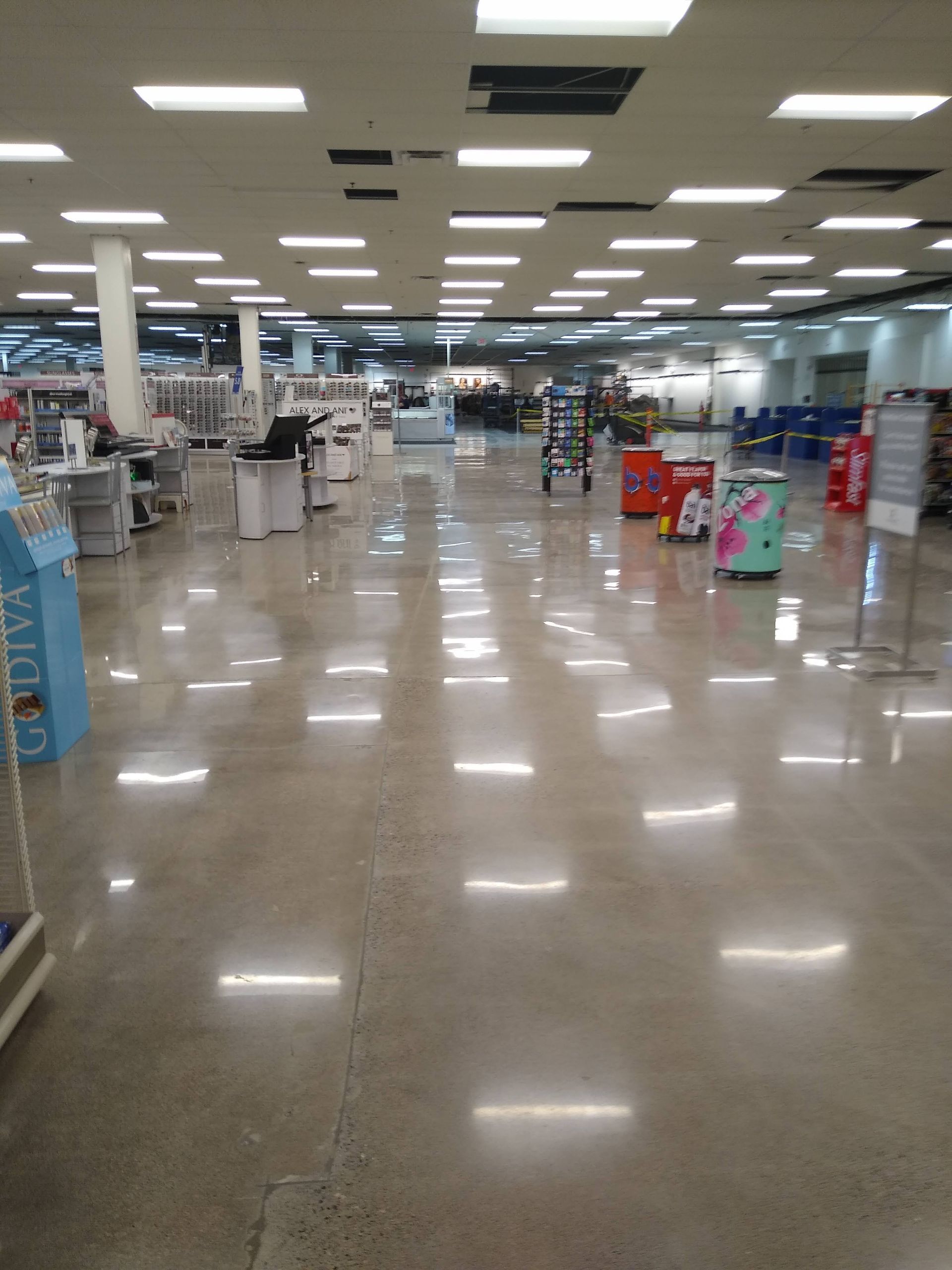 The inside of a store with a shiny floor