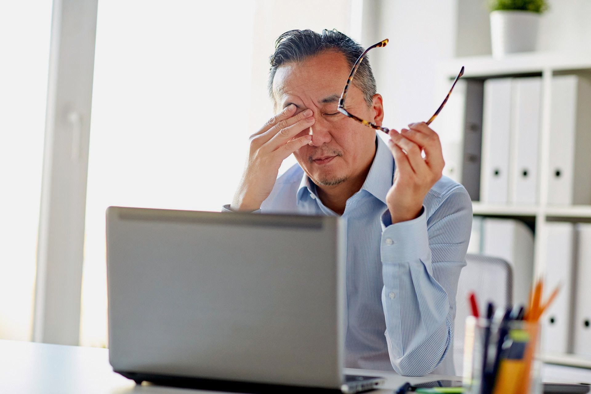 Landlord Rubbing His Eyes