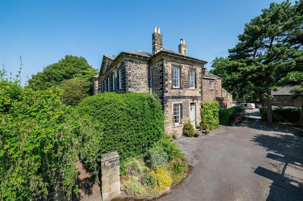 Carefully maintained period stone entrance – sash windows restored with meticulous attention to historic detail