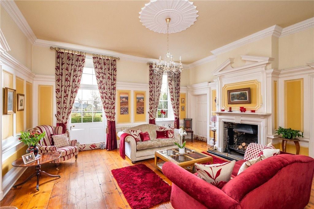 Premium painting in grand period drawing room – warm cream walls and crisp detailing enhancing original features
