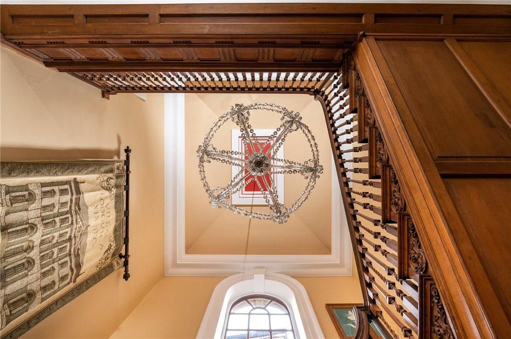 Carefully preserved ornate ceiling and staircase well – intricate timber detailing and central heritage feature restored