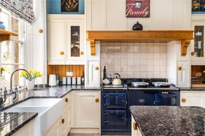 Expert decoration services for character homes in Cookridge and Adel, featuring a traditional blue kitchen.