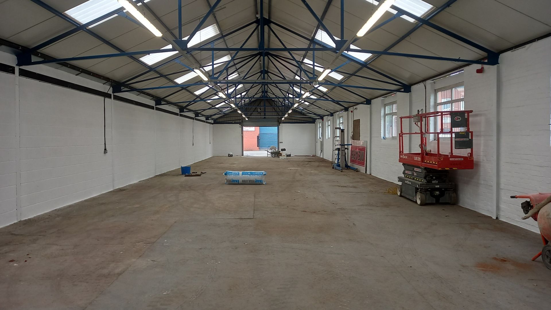 industrial - commercial - steelwork - blue - painting and decorating - breezeblock walls - white