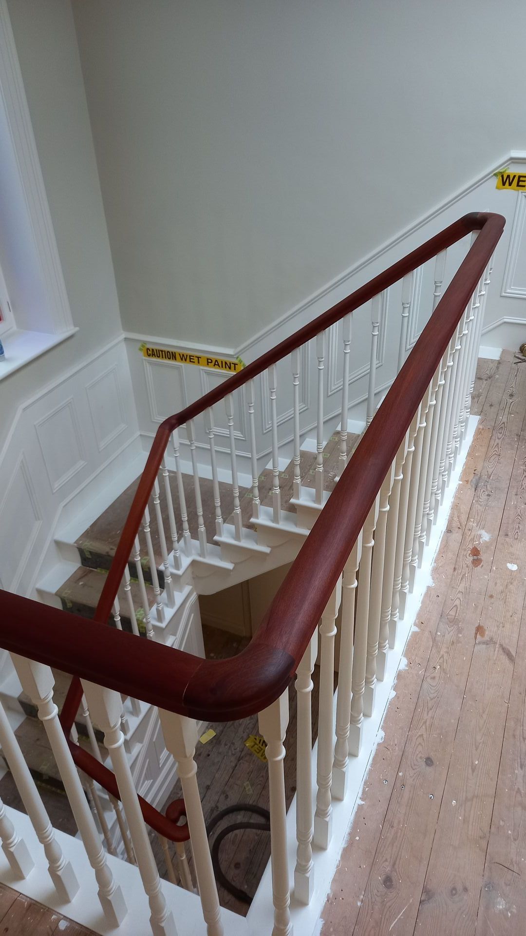 Handrail cleaned and perfectly prepared – smooth, dust-free surface ready for final premium top coats