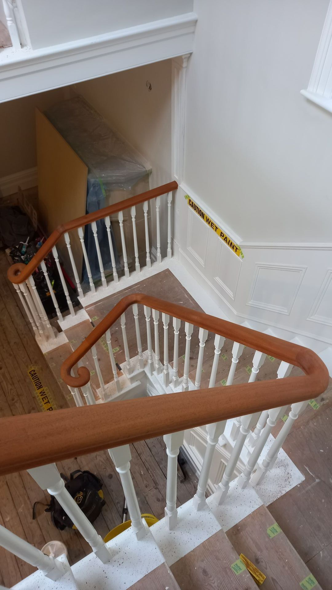 Careful preparation of a period staircase – masking and protection in place to safeguard original features