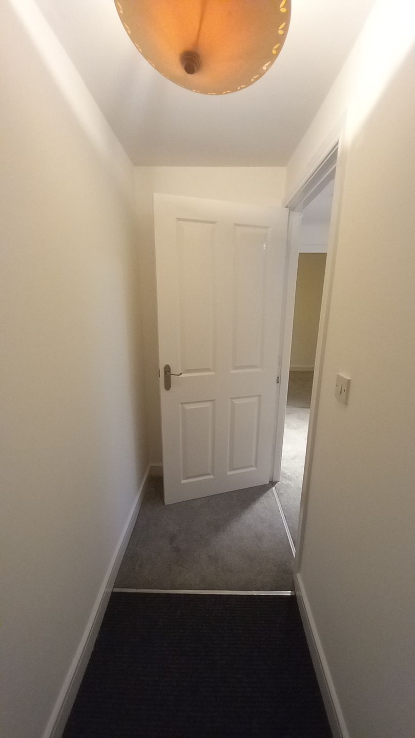 Social housing hallway and bedroom refresh – neutral walls coated with durable, low-maintenance paint for quick turnovers
