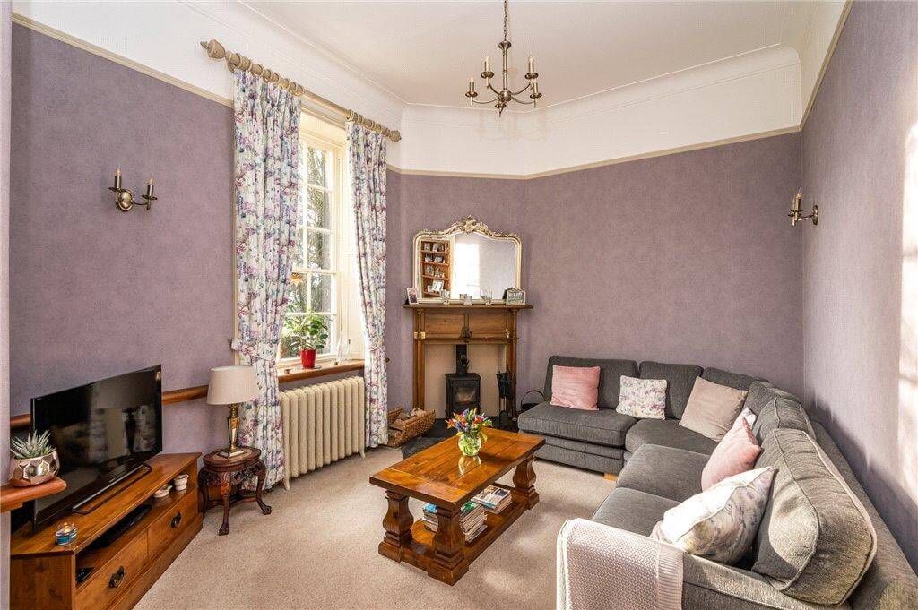 Lilac sitting room refresh – breathable paint and wallpaper application for warm period charm