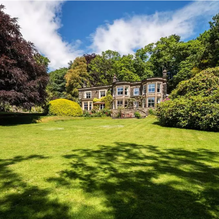 Sympathetic exterior restoration of heritage stone residence – timeless façade and sash windows enhanced