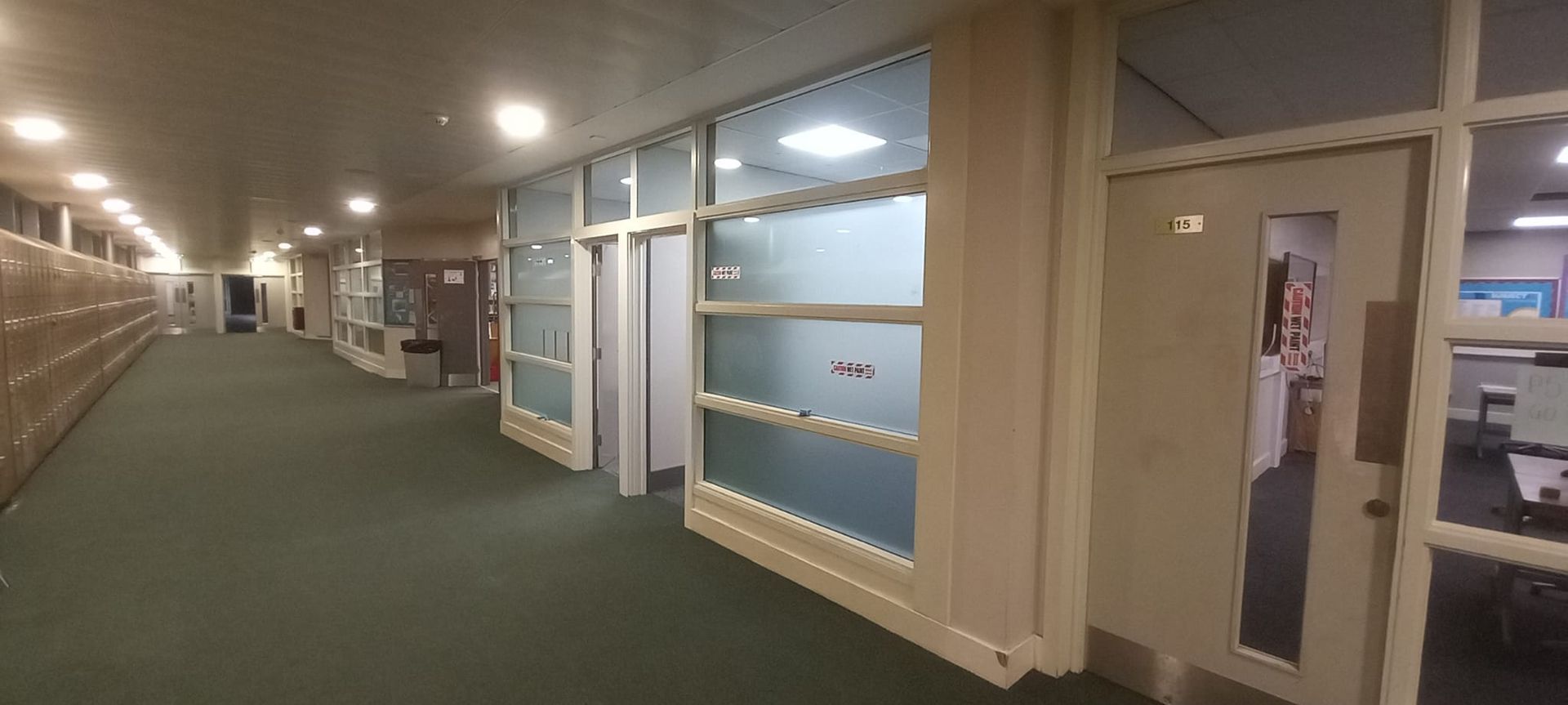 Seamless education corridor completion – crisp neutral palette and protective coatings delivered during school holidays 